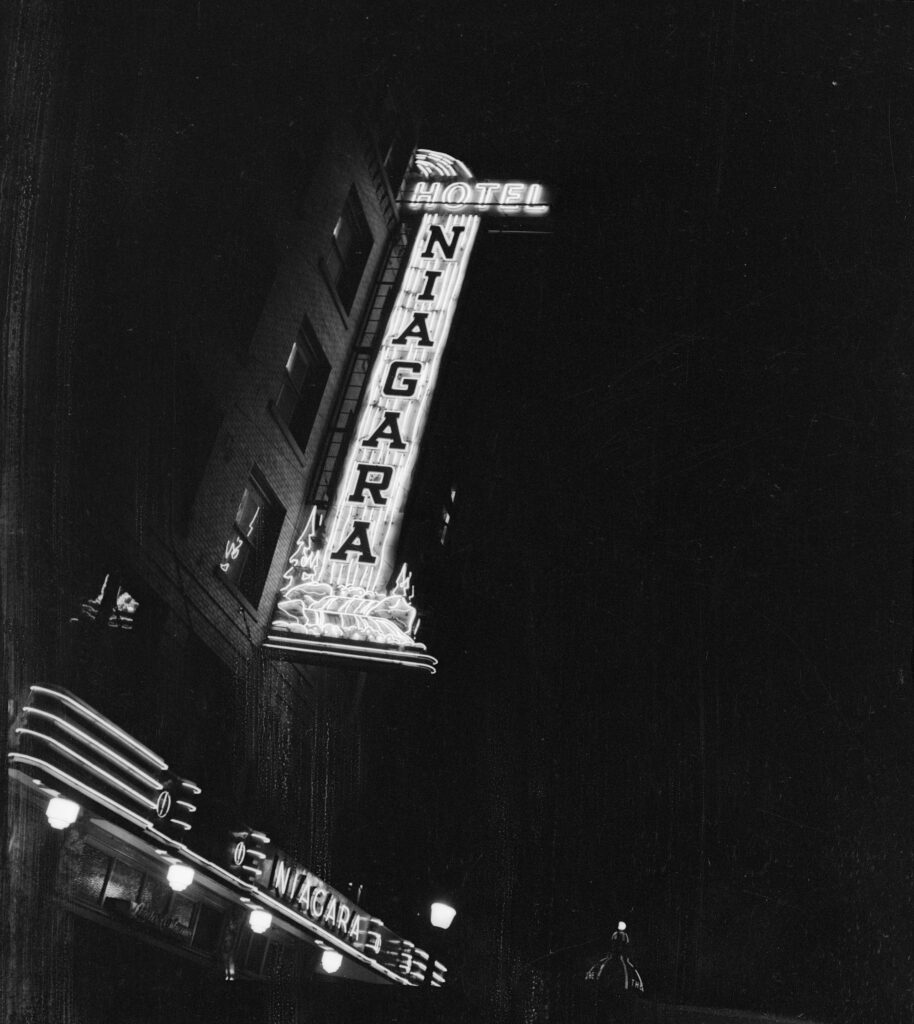 A 1949 view of the Niagara Hotel neon sign at 435 West Pender Street. Reference code: AM1545-S3-: CVA 586-12567