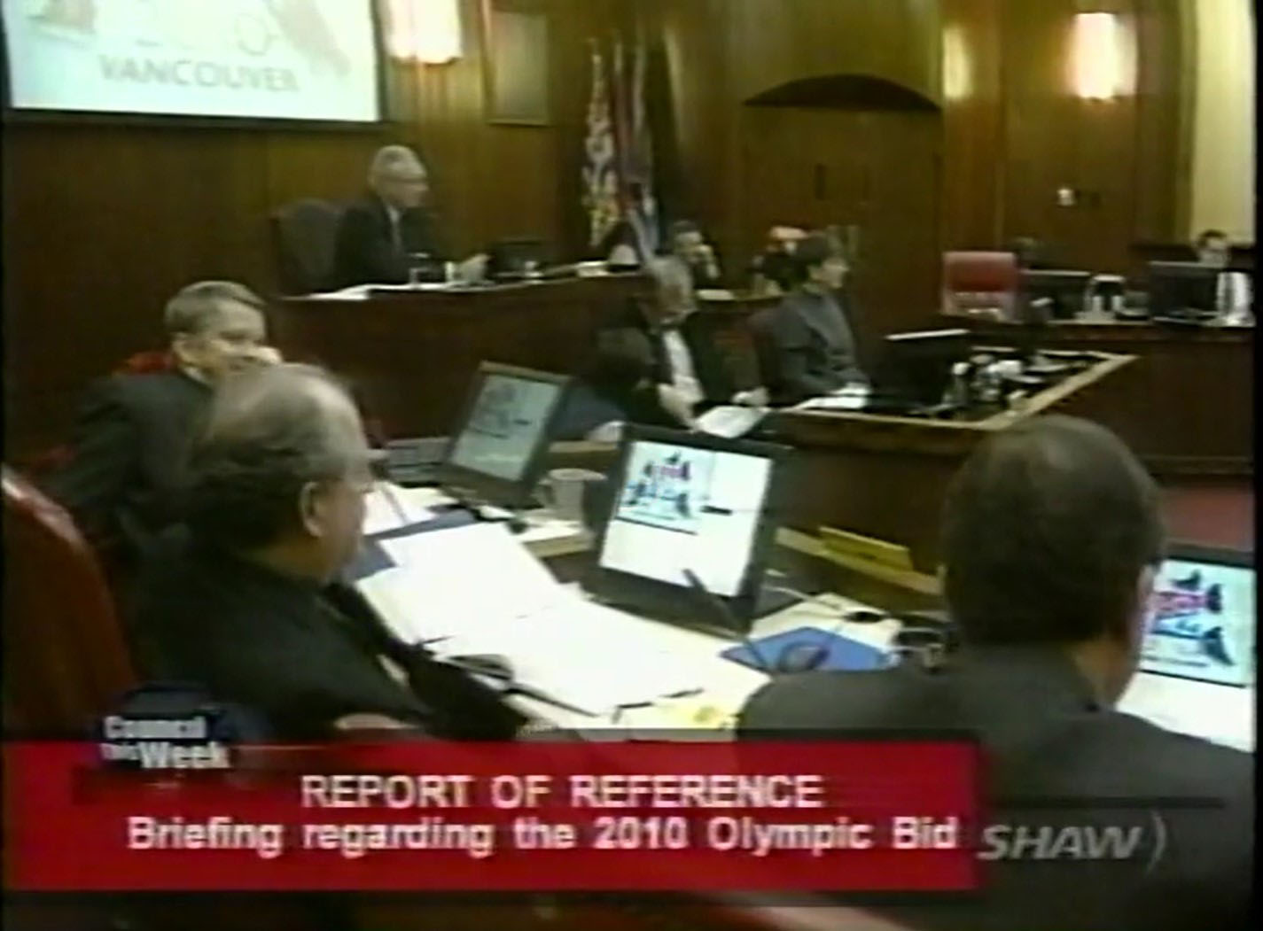 A screen capture showing members of Council, the Mayor and City Clerk’s Office staff at the Dec. 10, 2002 meeting during a report on the 2010 Olympic Bid. Reference code: AM1487-F10-: 2020.040.28